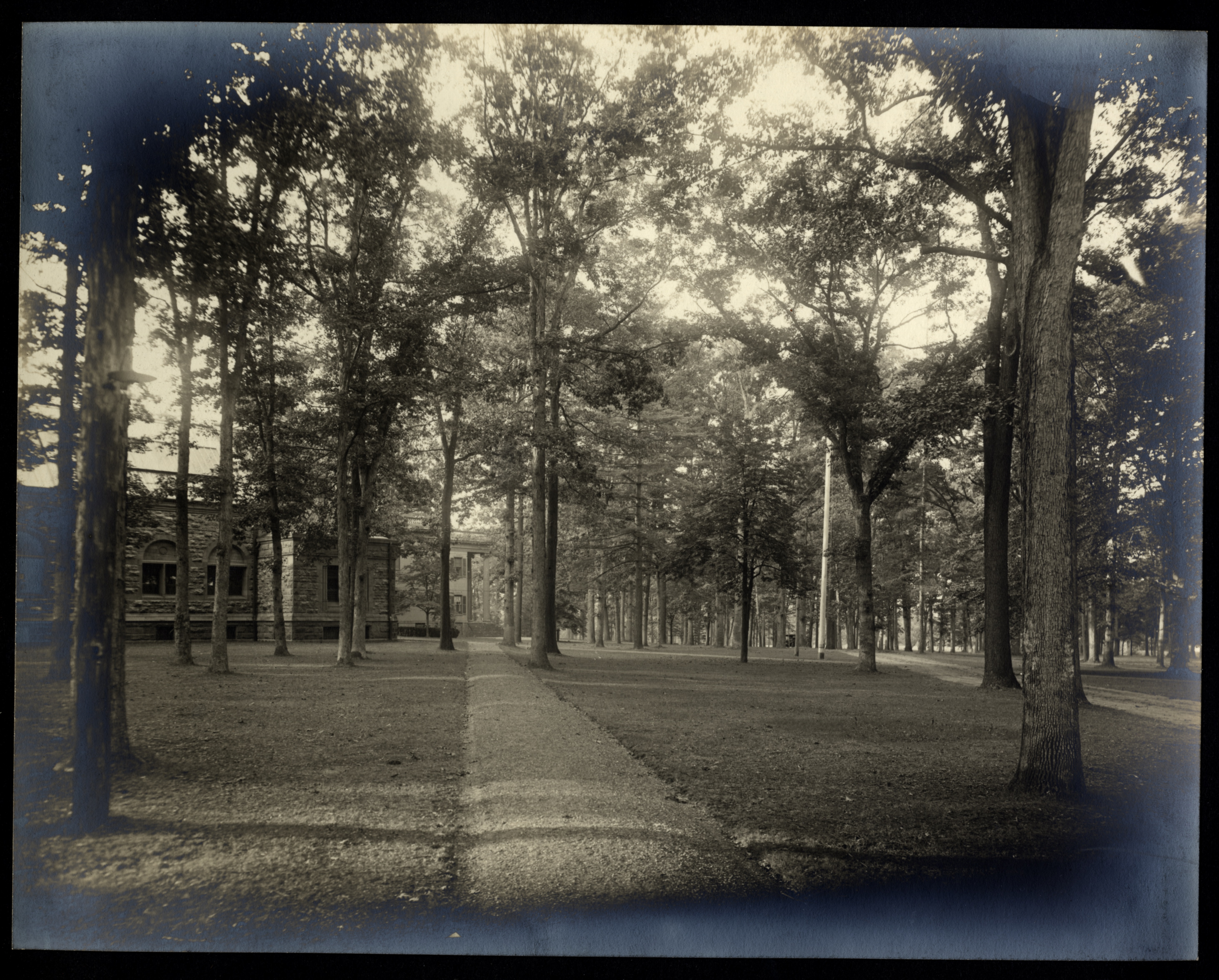 Path leading to Cornell Library with Mead Hall in far background, c1918